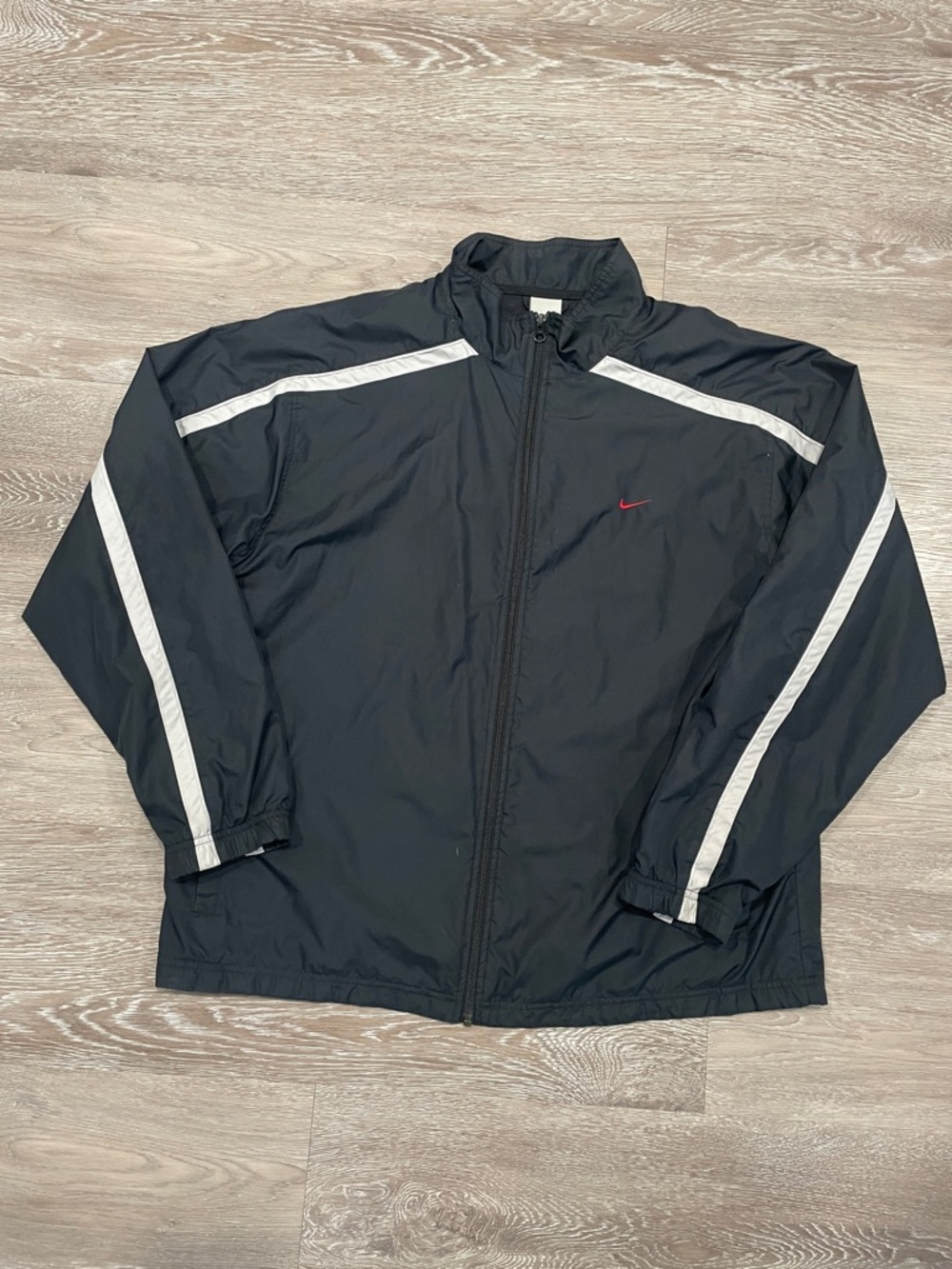 Vintage Nike Black Windbreaker Jacket with White Stripes and Red Swoosh